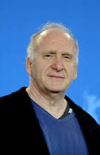 Amos Kollek som Director