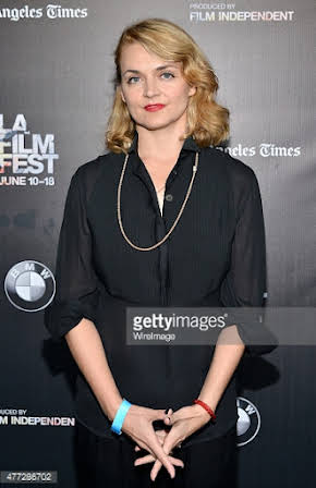 Natalie Johns as Director