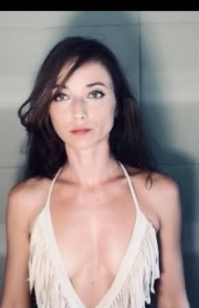 Olga Fedori as Director