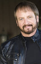 Mike Bara as Director