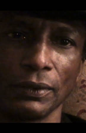 Michael Wright as 