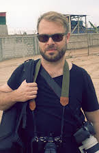 Aaron Ohlmann as Director