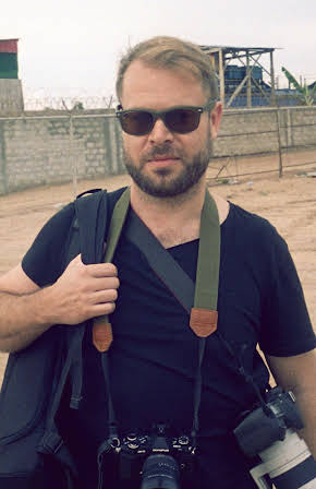 Aaron Ohlmann as Director