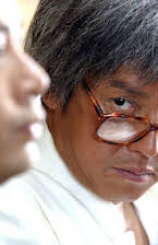 Alan Tam as 