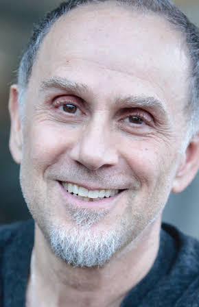 John Kassir as 