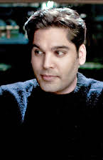 Ajmal Zaheer Ahmad as Director