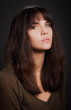 Elizabeth Saint as Director