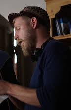 Luke Snellin som Director