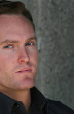 Brian A. Miller as Director