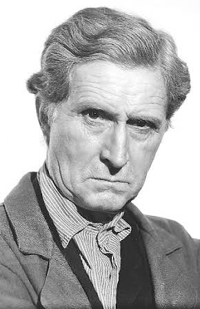 Russell Simpson as The Parson