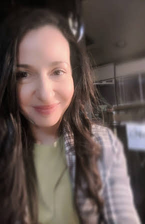 Ruba Nadda as Director