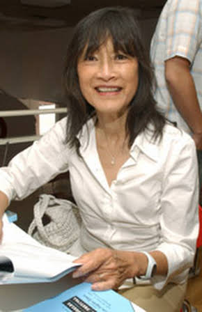 Freida Lee Mock as Director