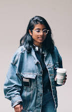 Minhal Baig as Director