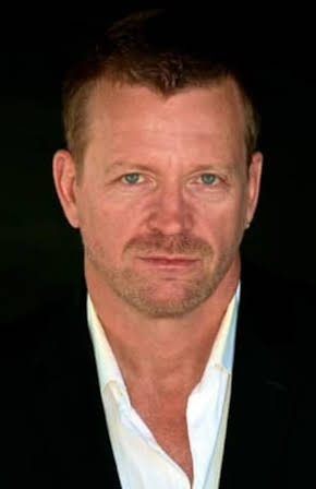 Conrad Goode as 