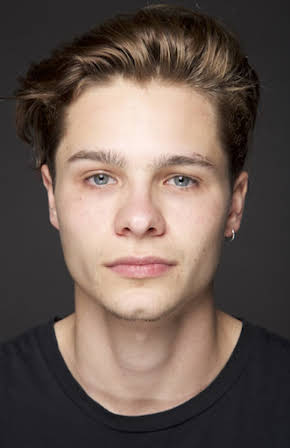 Toby Wallace as 