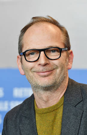 Etienne Comar as Director