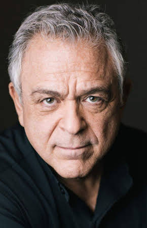 Eric Pollins as Marty Dellucci