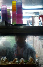 Tinge Krishnan som Director