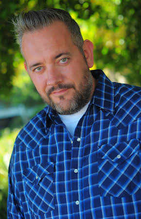 Ed Ackerman as 