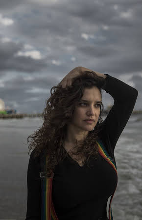 Ana Maria Hermida as Director