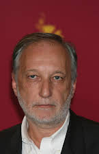 Francois Berleand como Headmaster Rachin