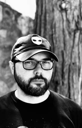 Derek Hayes as Director