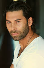 Alec Rayme som Hassid