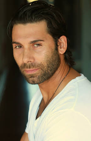 Alec Rayme as Hassid