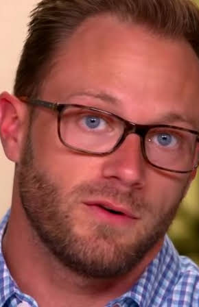 Adam Busby as 