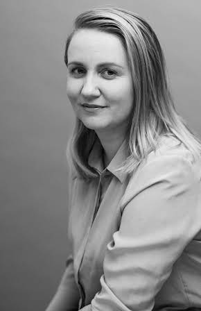 Elli Toivoniemi as Director