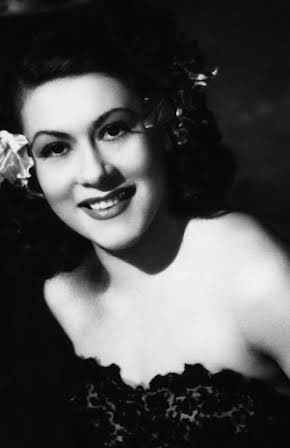 Margit Symo as 