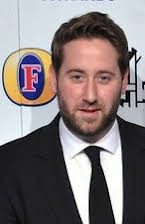 Jim Howick as 