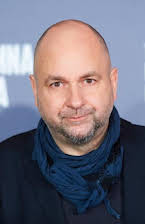 Łukasz Kośmicki som Director