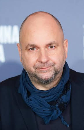 Łukasz Kośmicki as Director
