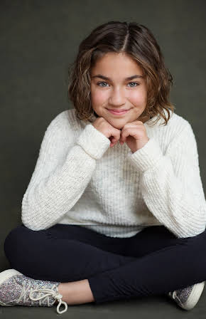 Michela Luci as 