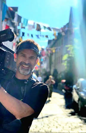 Zachary Boggs as Director