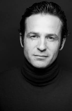 Gustavo Salmerón as Director