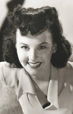Pamela Blake as 