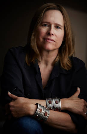 Marita Grabiak as Director