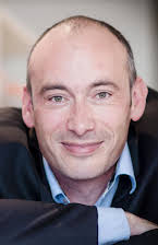 Éric Warin som Director