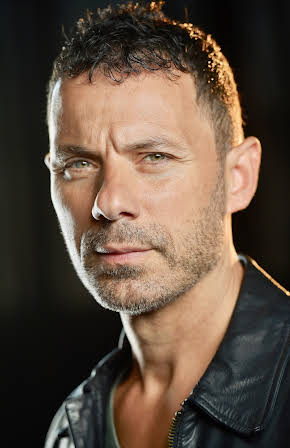 Cengiz Dervis as Director