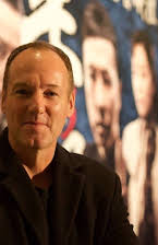 Bey Logan as Director