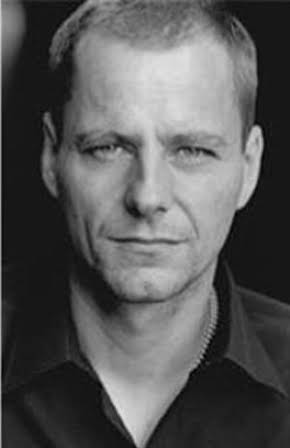 Drew Edwards as Director