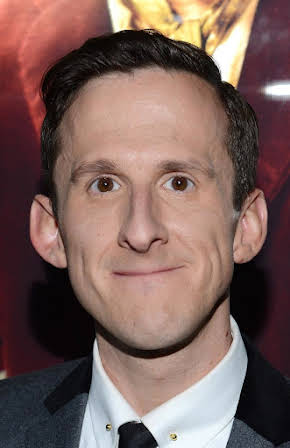 Adam Brown as 