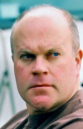 Mike Pniewski as 