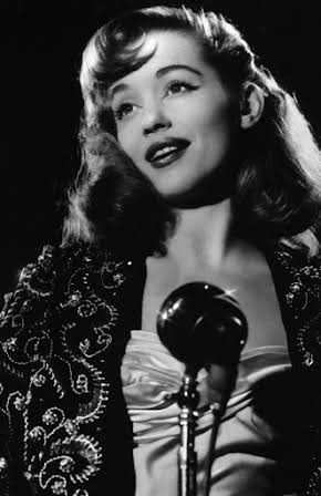 Barbara Laage as 