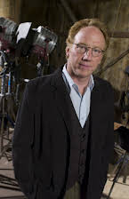 Timothy Busfield como 