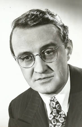 Arthur Shields as Reverend Cyril Playfair