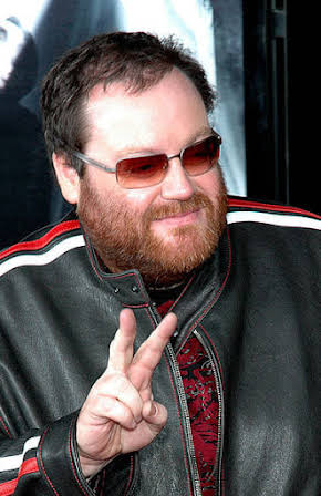 John Moore as Director