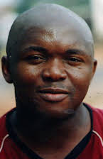 Alain Dzukam Simo as 